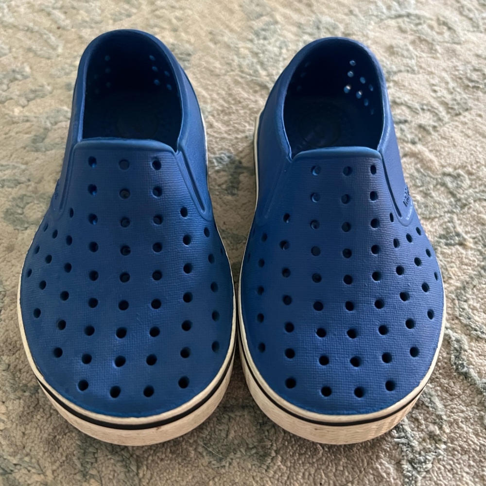 Boys Native slip on shoes in bright blue - child size 8.